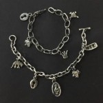 Charm bracelets. Handmade chain and sand-cast charms.. Sterling silver