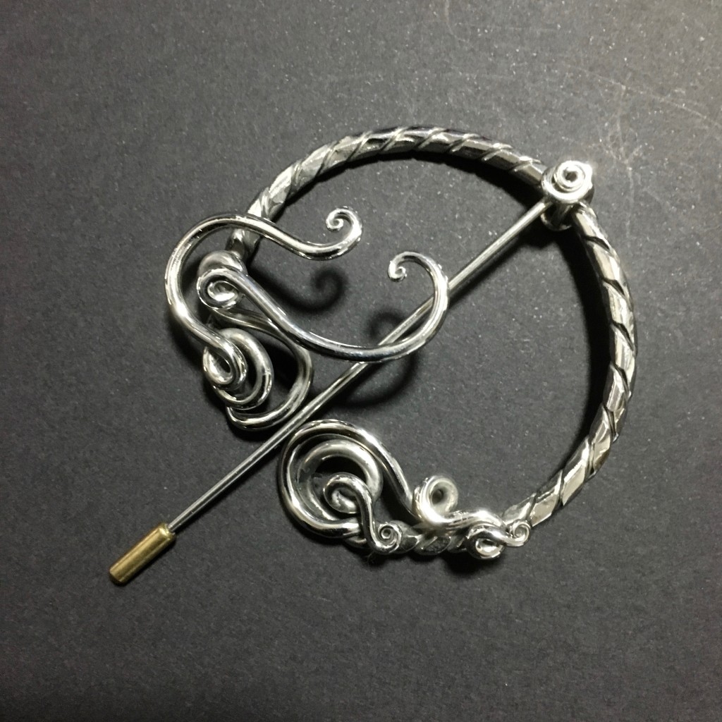 Brooch ... Penannular style .... hot worked marine grade stainless steel